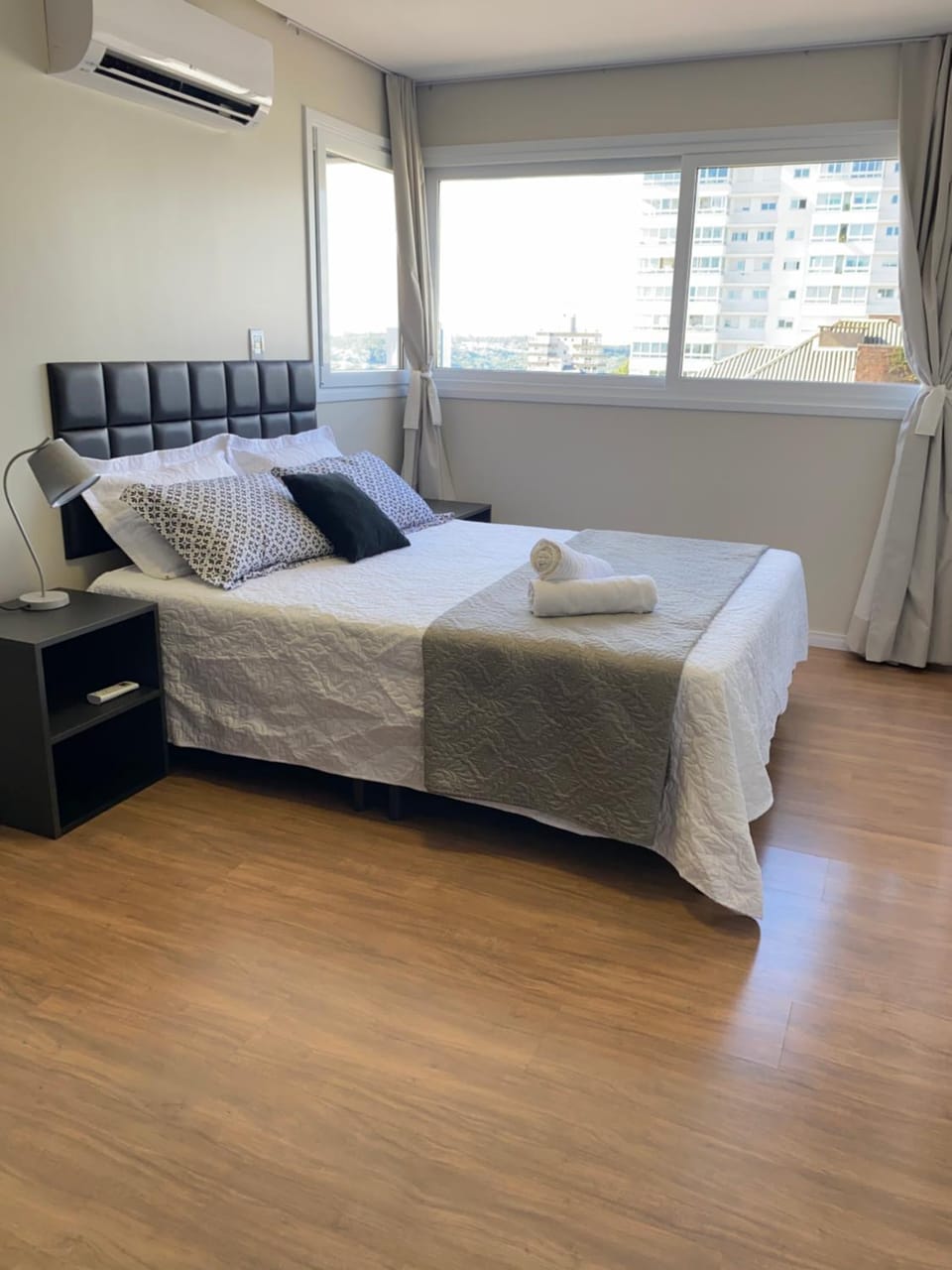 Bed, Photo of the whole room, Bedroom, towels, air conditioner