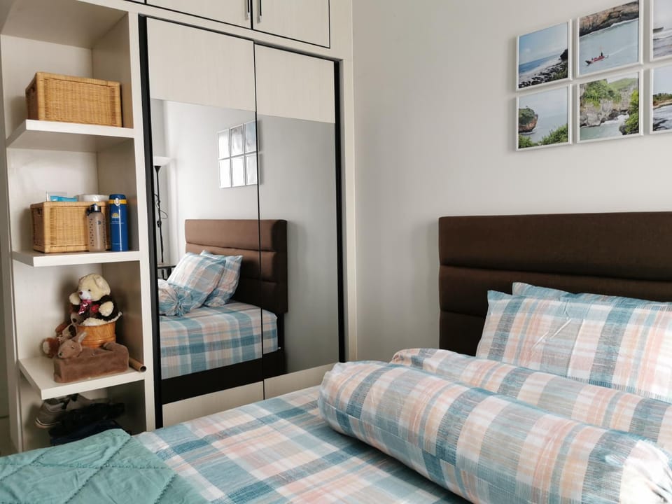 A Peaceful Room at Barsacity Apartment by Ciputra Apartment in Special Region of Yogyakarta