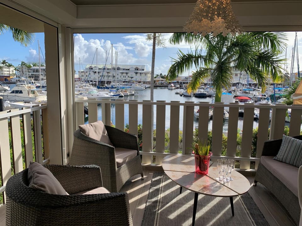 View (from property/room), Balcony/Terrace, Living room, Seating area, Sea view