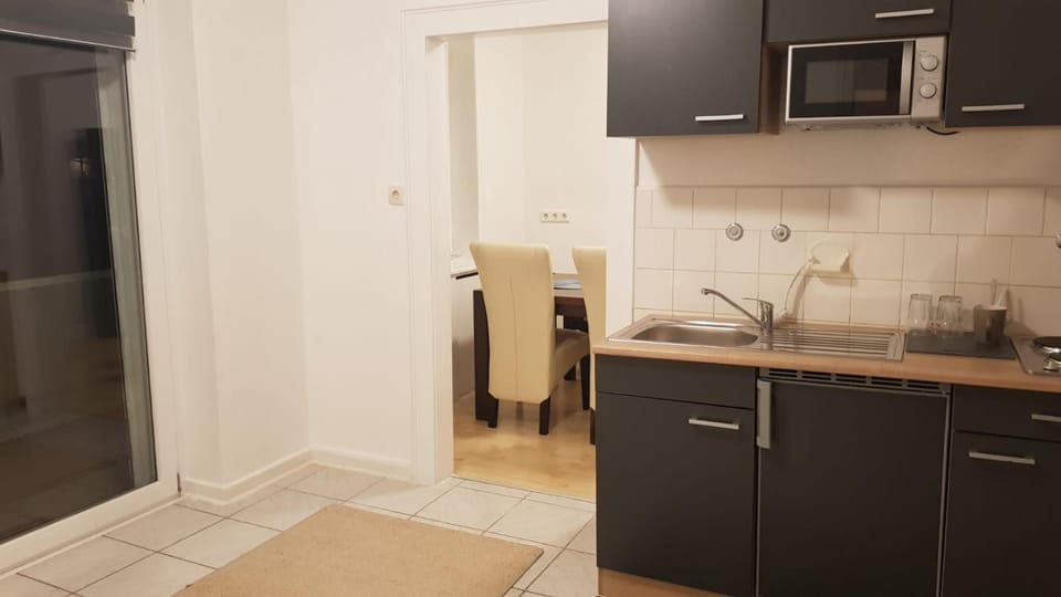 Kitchen or kitchenette, oven, stove