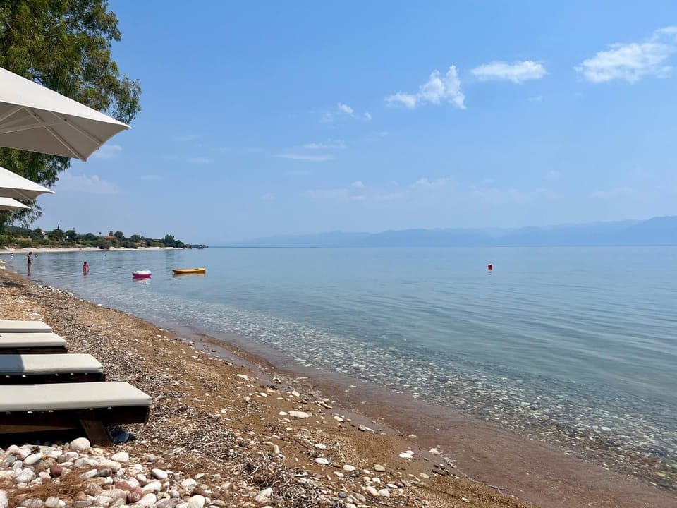 Property building, Natural landscape, Beach, Sea view
