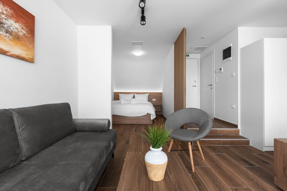 Bed, Living room, Seating area, Bedroom