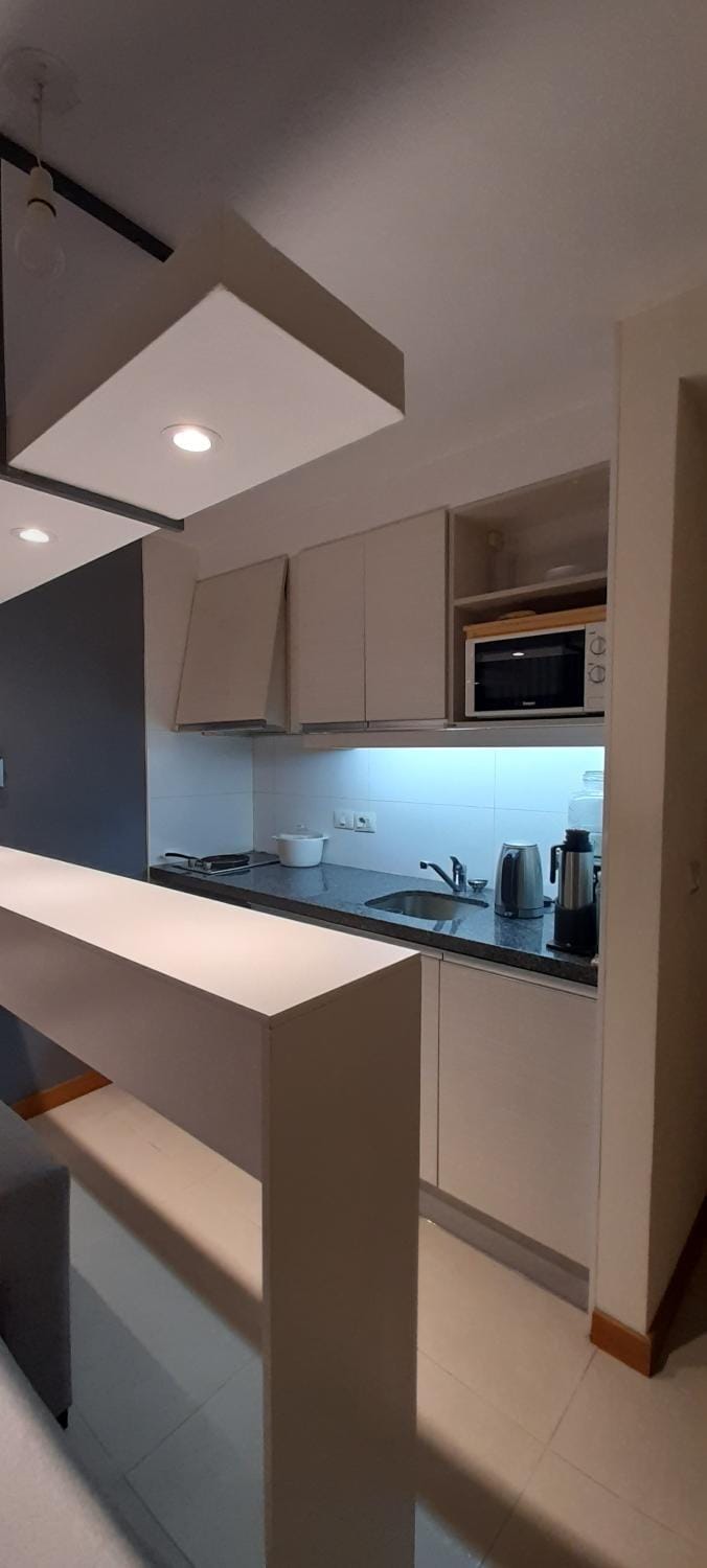 Kitchen or kitchenette, stove