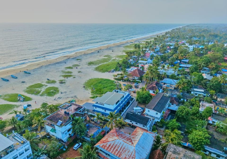 Property building, Nearby landmark, Day, Natural landscape, Bird's eye view, Beach, City view, Sea view