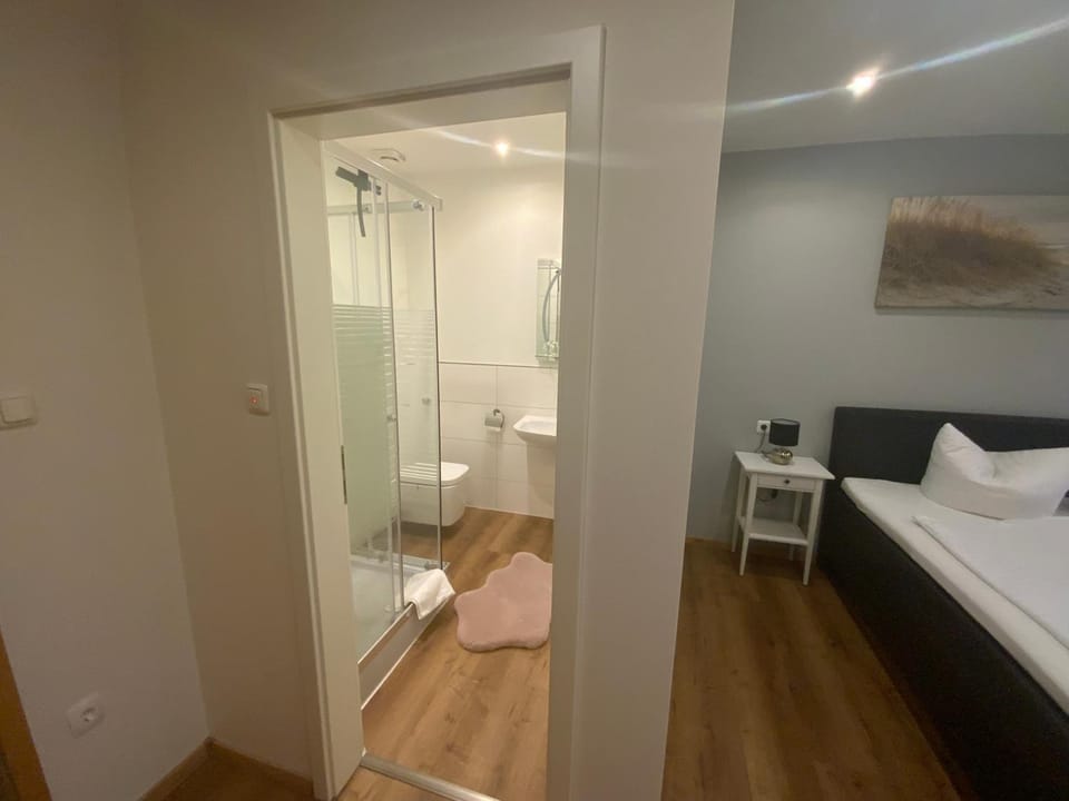 Shower, Toilet, Bed, Bathroom, Photo of the whole room, Bedroom
