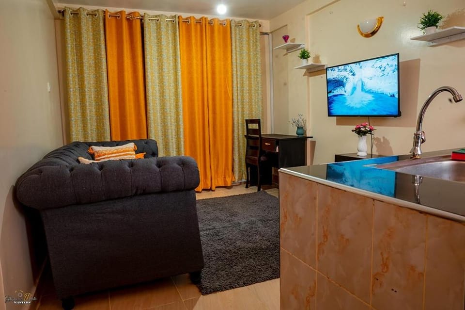 STYLISH 1BR APARTMENT IN KISUMU: FAST WI-FI, NETFLIX, SECURE PARKING Apartment in Uganda