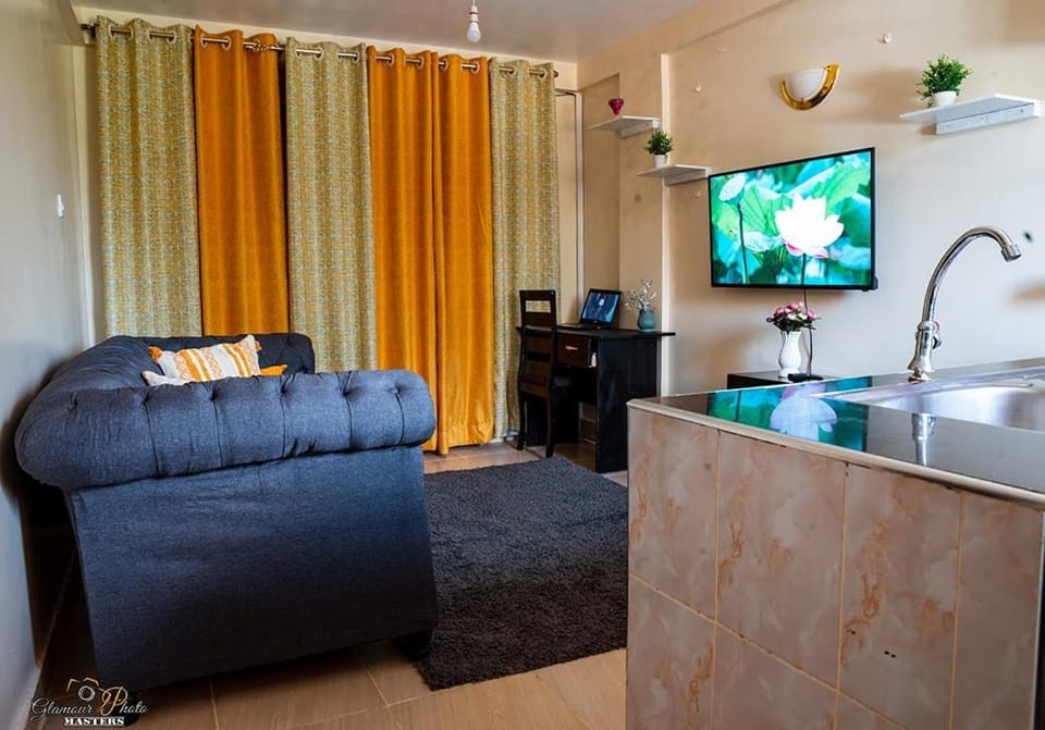 STYLISH 1BR APARTMENT IN KISUMU: FAST WI-FI, NETFLIX, SECURE PARKING Apartment in Uganda