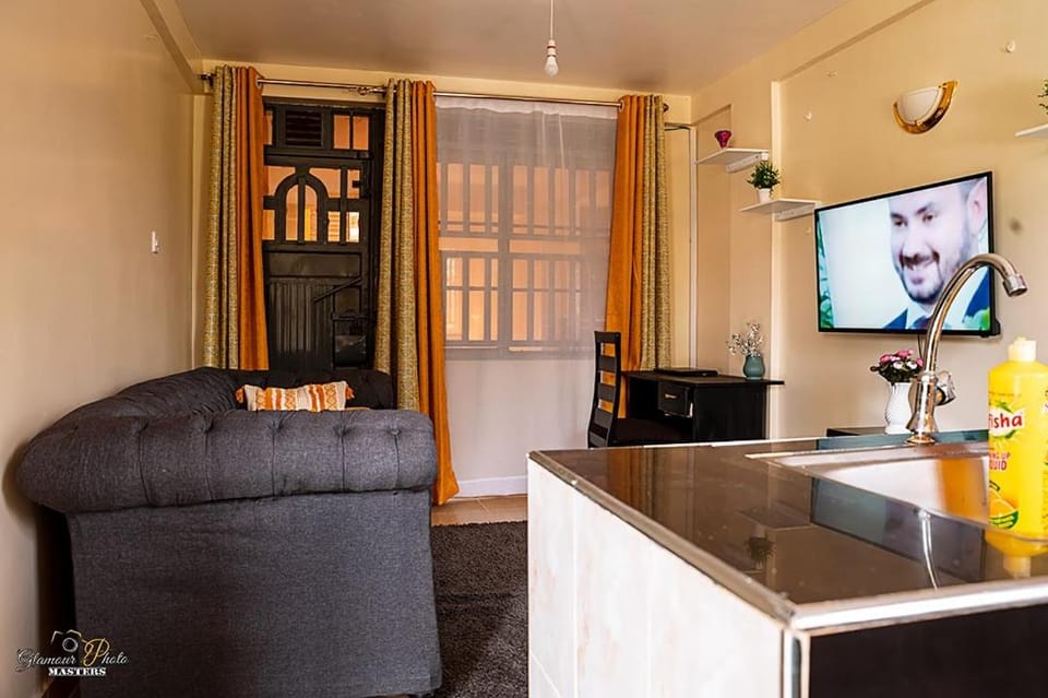 STYLISH 1BR APARTMENT IN KISUMU: FAST WI-FI, NETFLIX, SECURE PARKING Apartment in Uganda