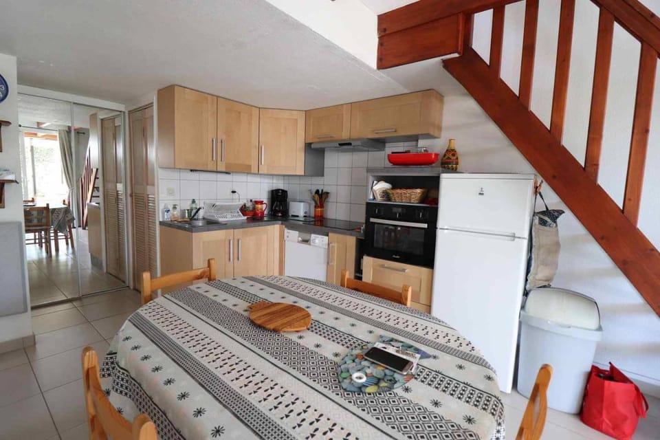 Kitchen or kitchenette, dishwasher, oven, stove, toaster