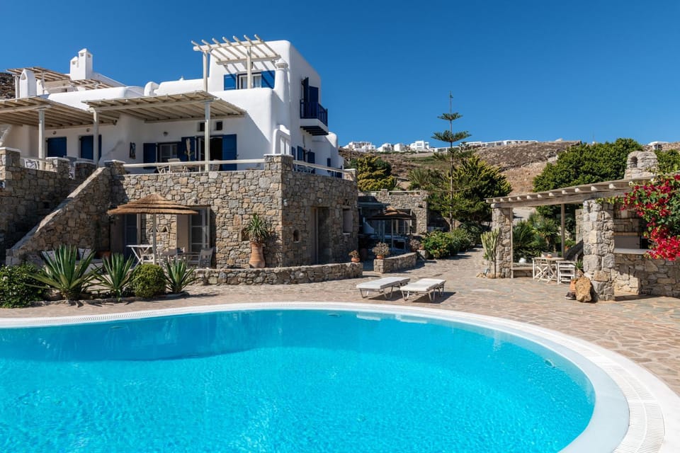 Property building, Day, Natural landscape, Pool view, Swimming pool, sunbed