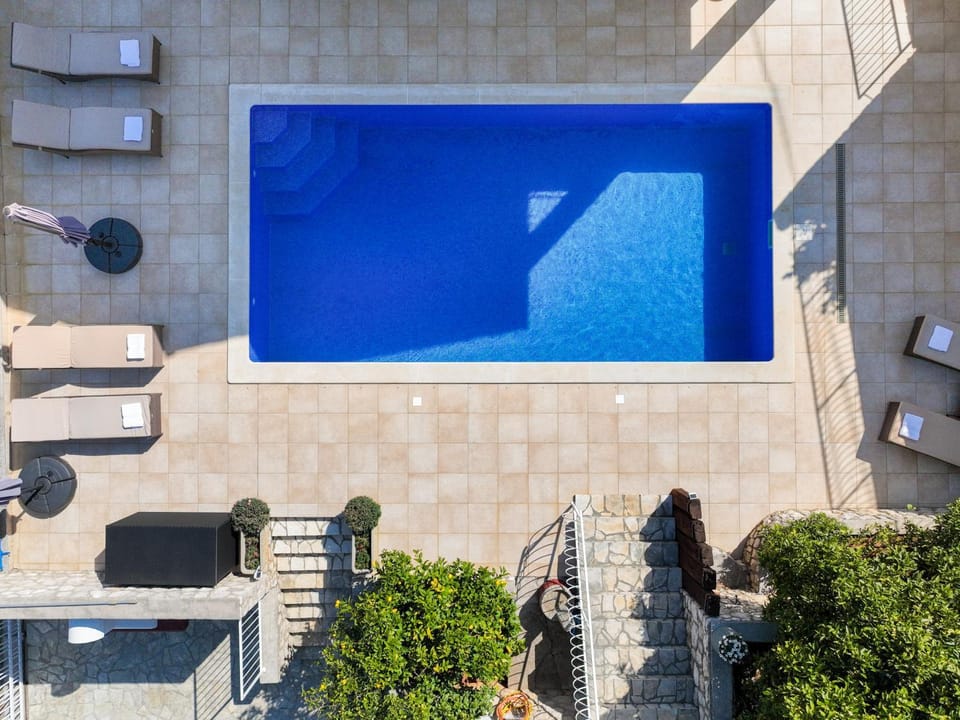 Patio, Day, Pool view, Swimming pool, sunbed