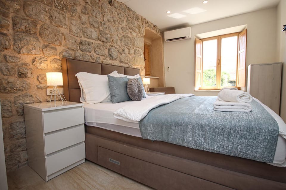 Bed, Bedroom, towels, wardrobe, air conditioner