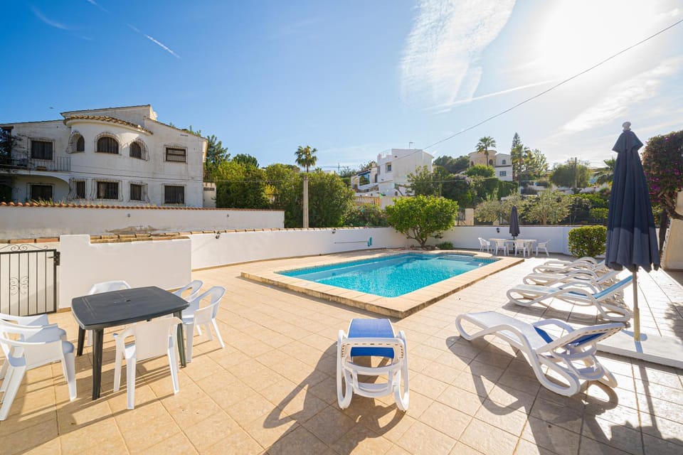 Property building, Living room, Swimming pool