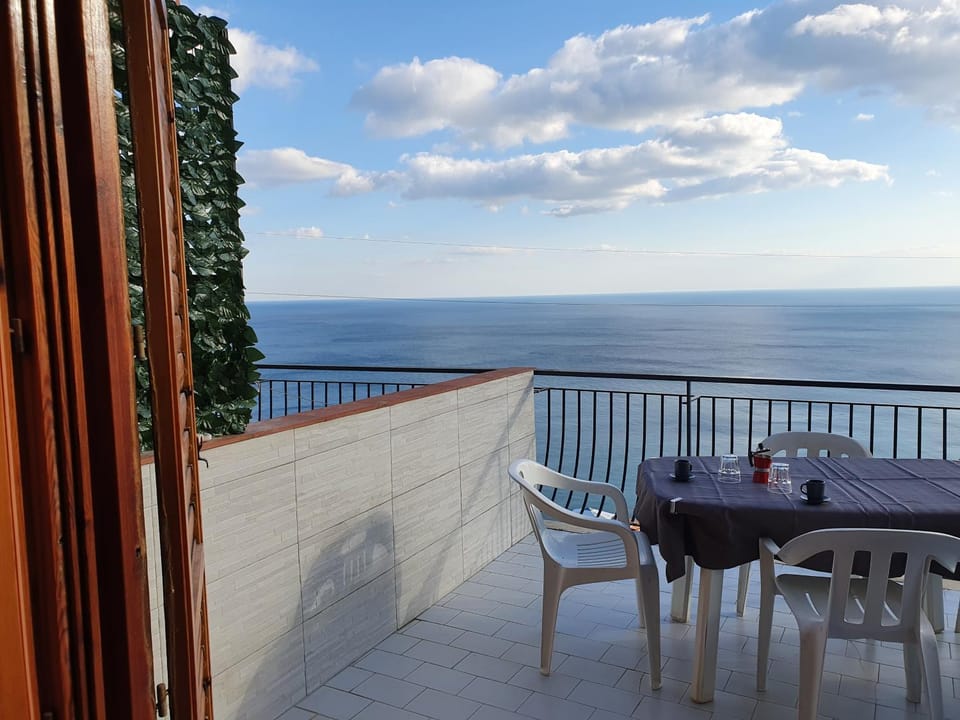Patio, Day, Natural landscape, View (from property/room), Balcony/Terrace, Living room, Seating area, Dining area, Sea view