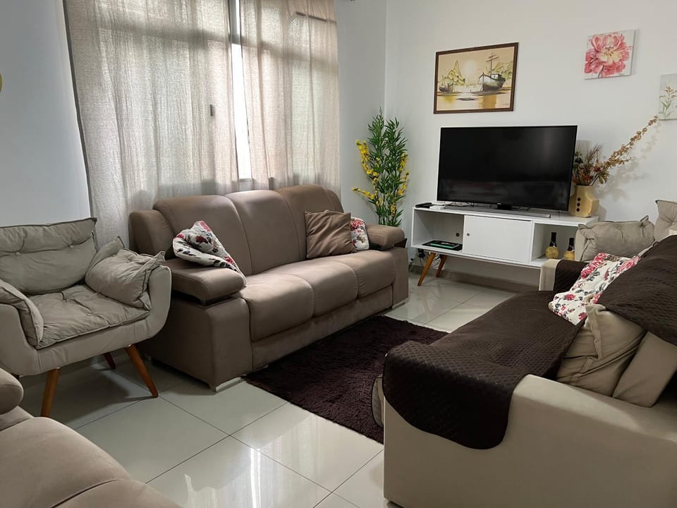 Apartamento 100 metros da praia das Astúrias Apartment in State of São Paulo