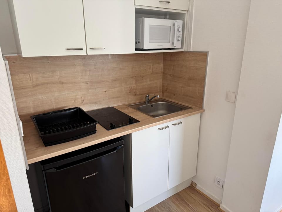Kitchen or kitchenette, stove, kitchen