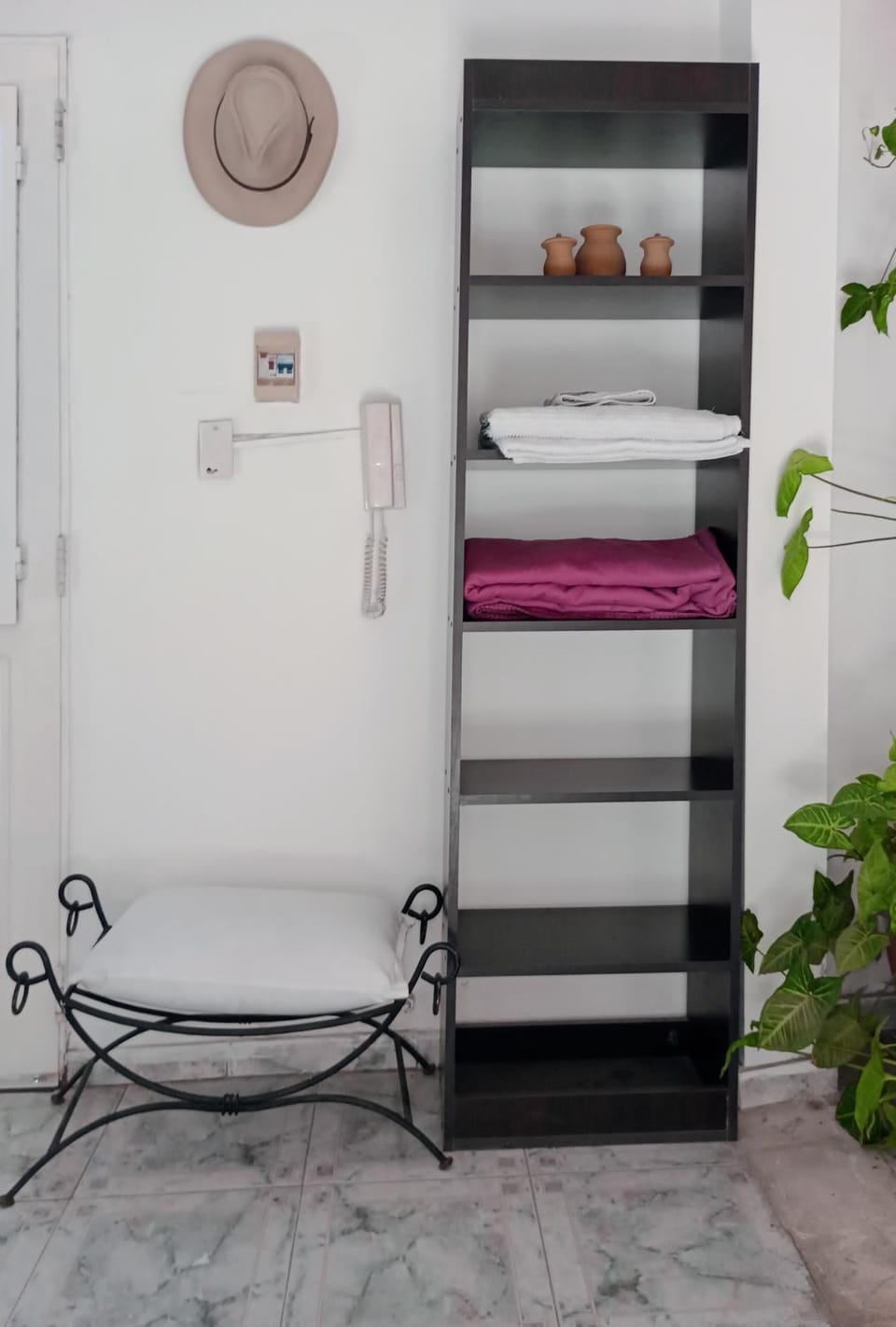 Photo of the whole room, towels, wardrobe, air conditioner