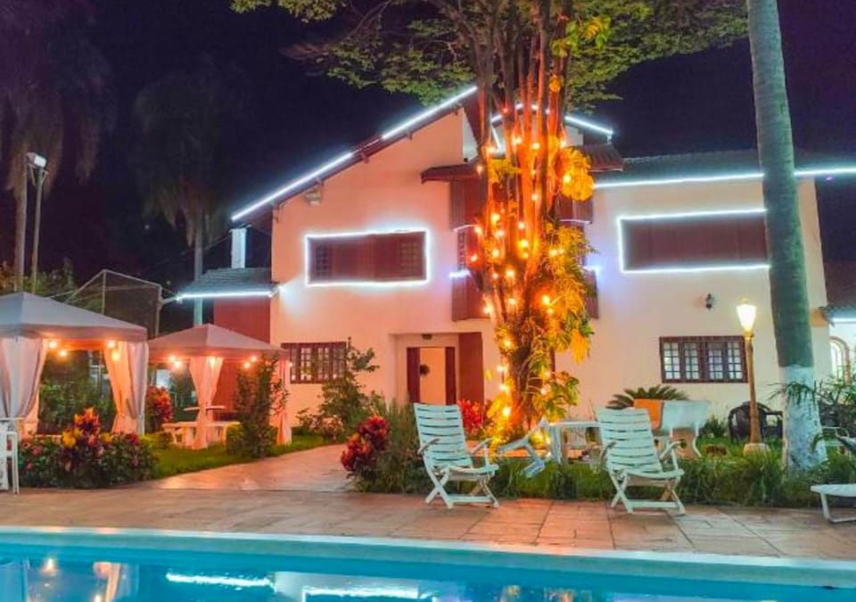Property building, Patio, Night, Garden, Garden view, Pool view, Swimming pool, Swimming pool, sunbed