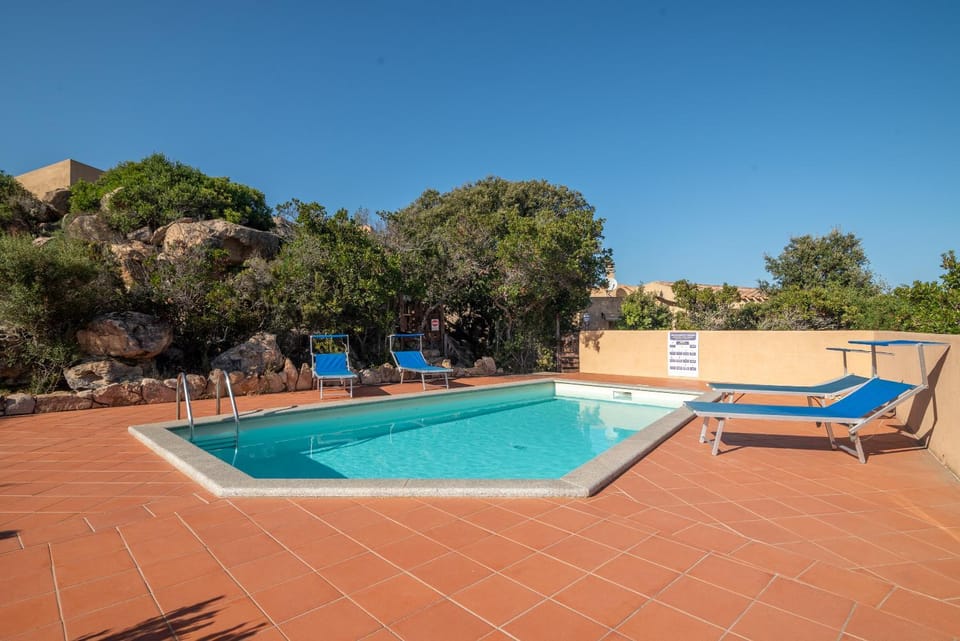 Property building, Living room, Swimming pool