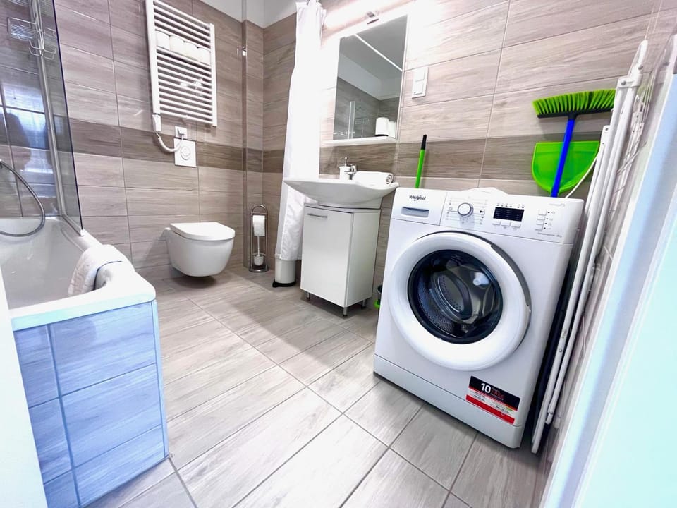 Toilet, Bathroom, towels, washing machine