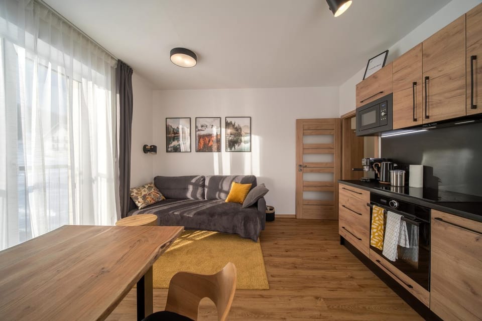 Kitchen or kitchenette, Living room, Seating area, Dining area