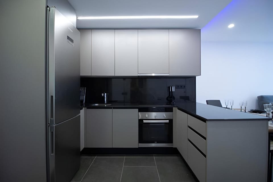 Kitchen or kitchenette, oven