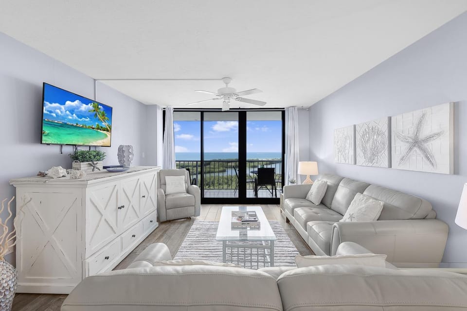 Beachfront condo with views of beach, pool and grill House in Marco Island