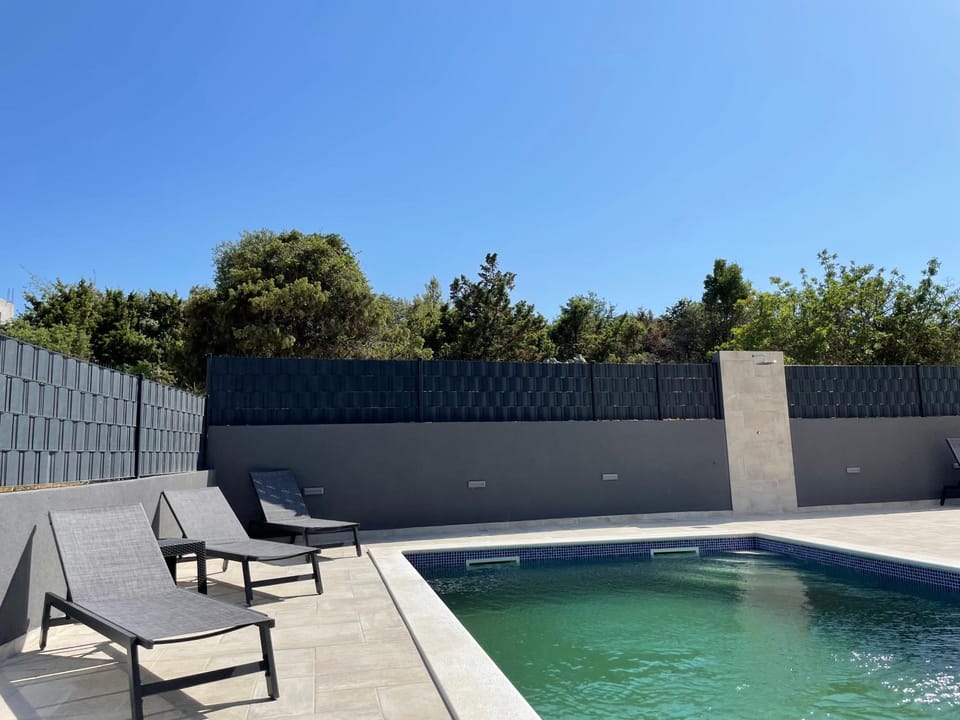 Patio, Day, Pool view, Swimming pool, sunbed