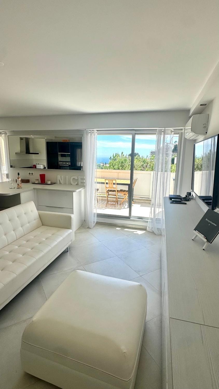 TV and multimedia, View (from property/room), Living room, Seating area, Sea view