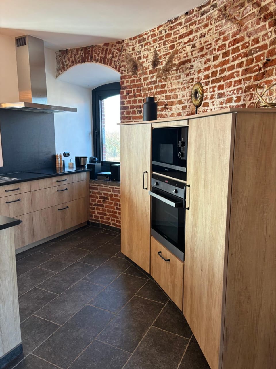 Kitchen or kitchenette, dishwasher, oven, stove, toaster