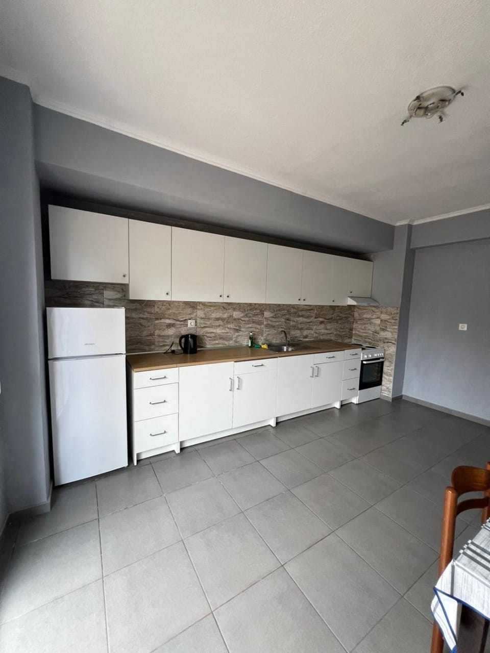 Kitchen or kitchenette, oven, stove