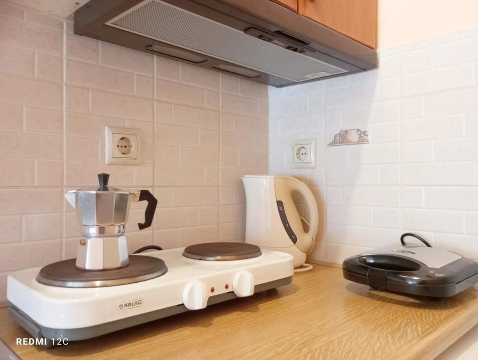 Kitchen or kitchenette, stove