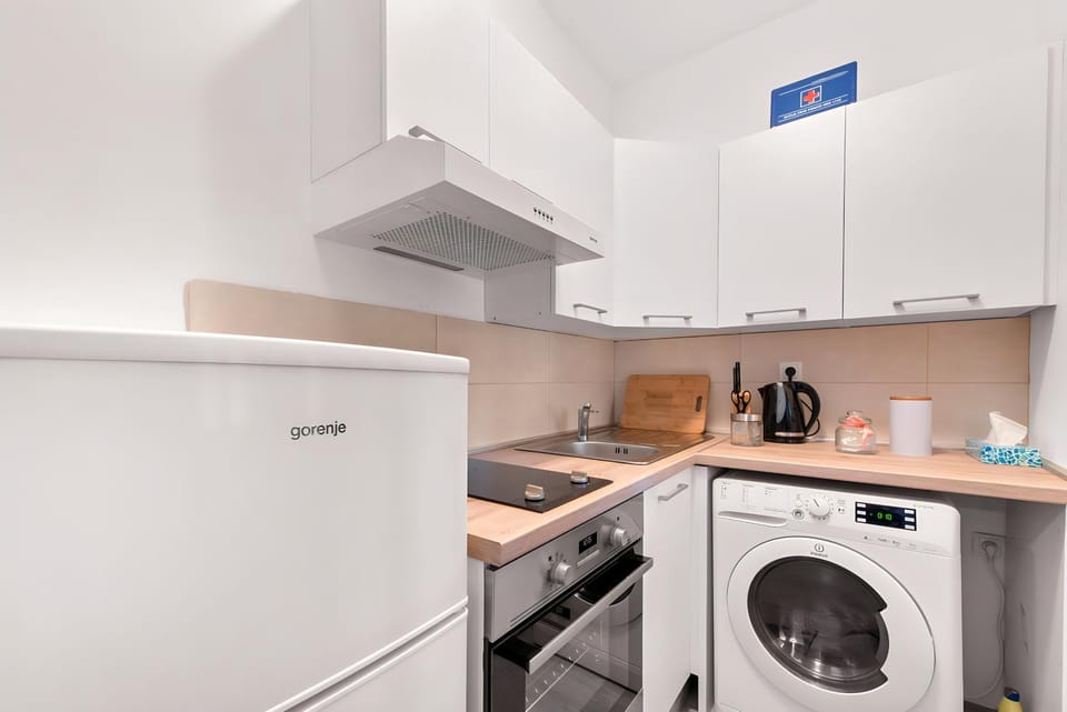 Kitchen or kitchenette, washing machine