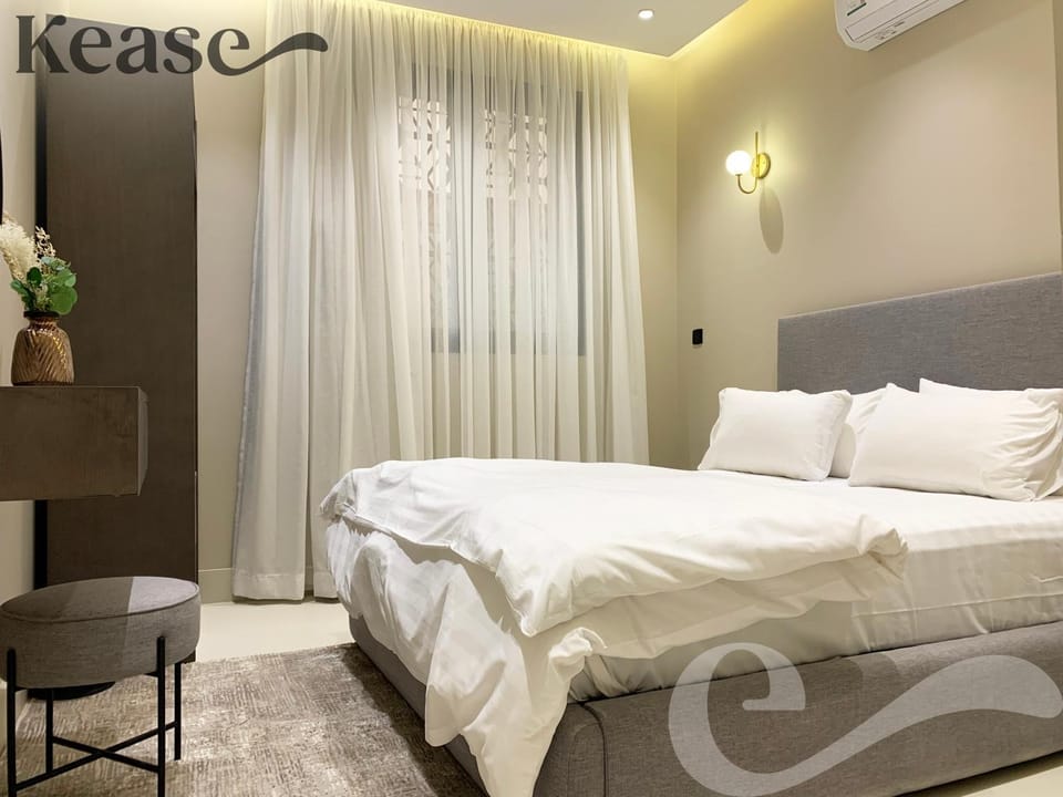 Bed, Photo of the whole room, Bedroom, Text overlay, air conditioner