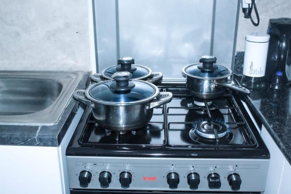 Kitchen or kitchenette, stove