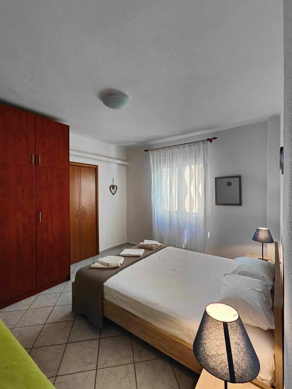 Bed, Photo of the whole room, Bedroom, flat iron, towels, wardrobe