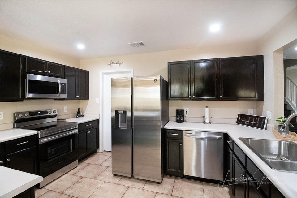 Kitchen or kitchenette, dishwasher, microwave, oven, stove, kitchen