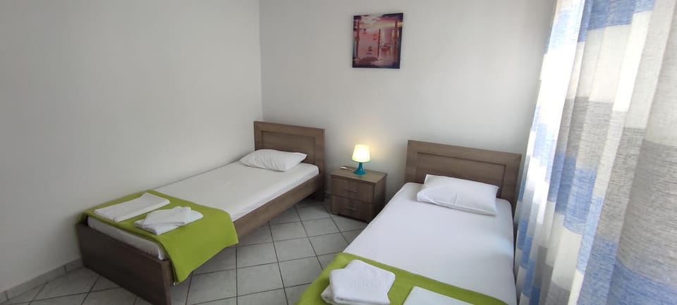 Bedroom, hair dryier, locker, towels