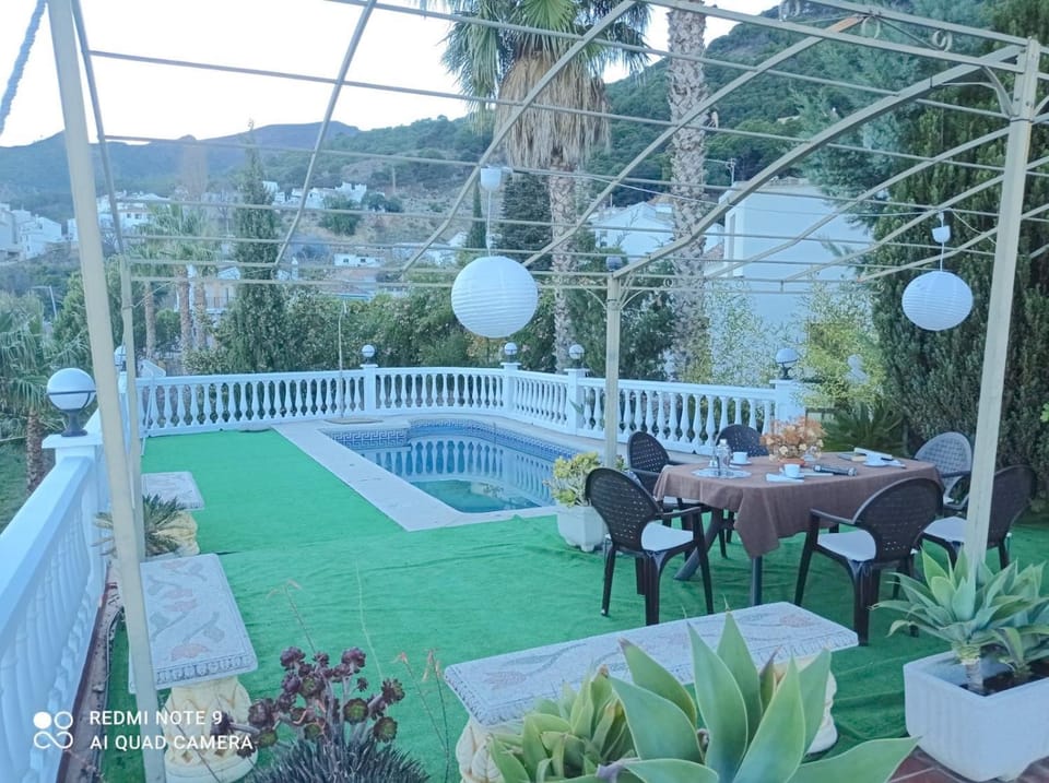 Property building, Living room, Swimming pool