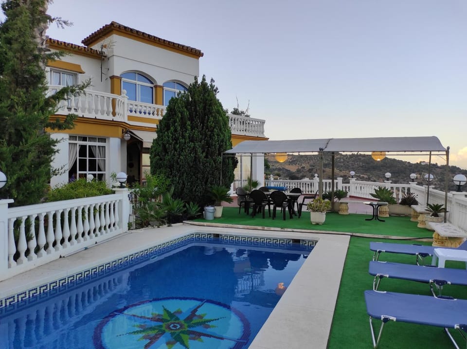 Property building, Living room, Swimming pool