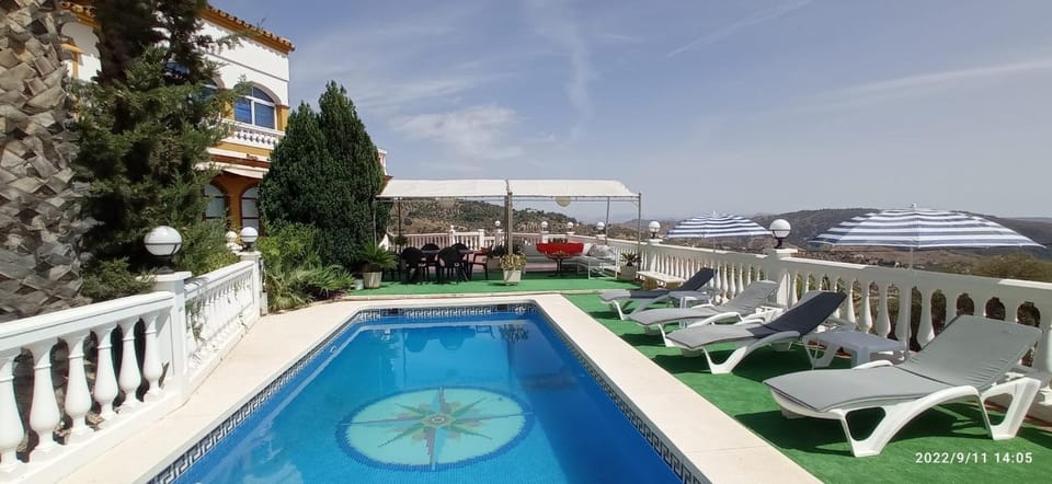 Property building, Living room, Swimming pool
