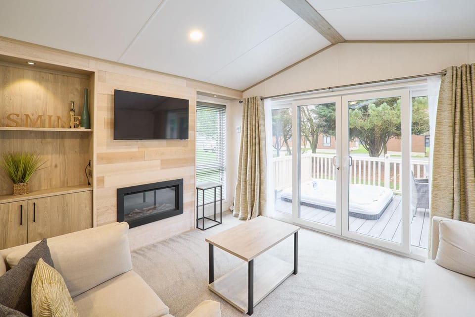 Jasmine Lodge with Hot Tub Chalet in England