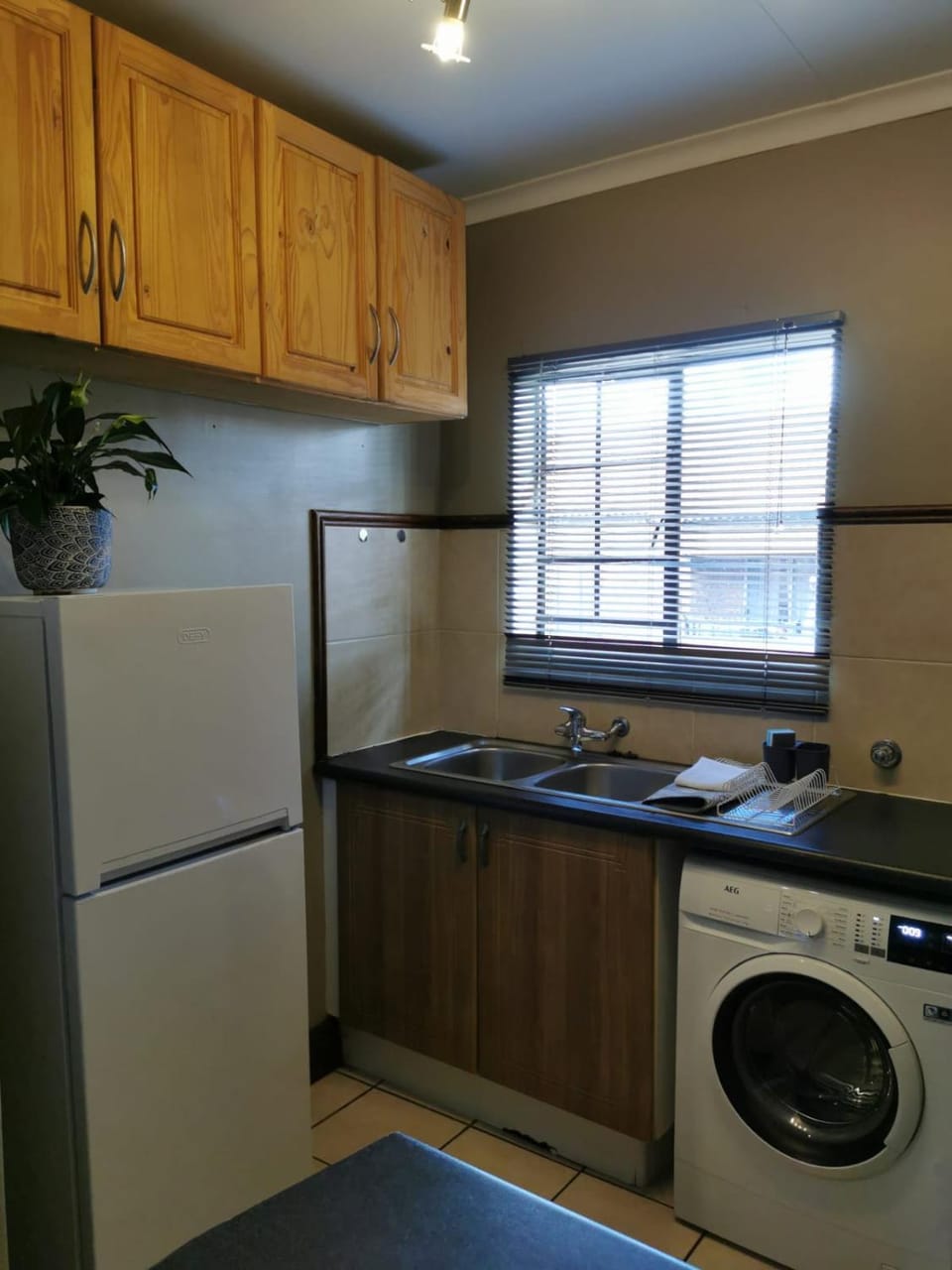 Kitchen or kitchenette, washing machine