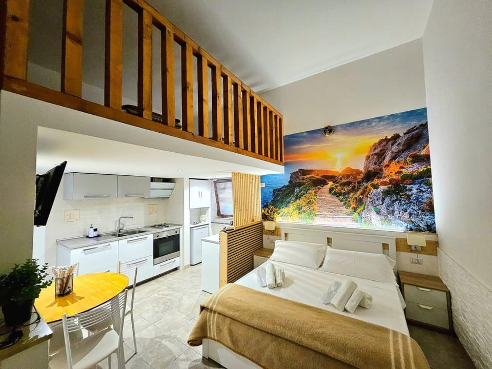 Bed, TV and multimedia, Kitchen or kitchenette, Living room, Photo of the whole room, Bedroom, oven, safe, stove, kitchen