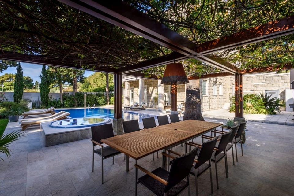 Property building, Patio, Seating area, Garden view, Swimming pool, sunbed