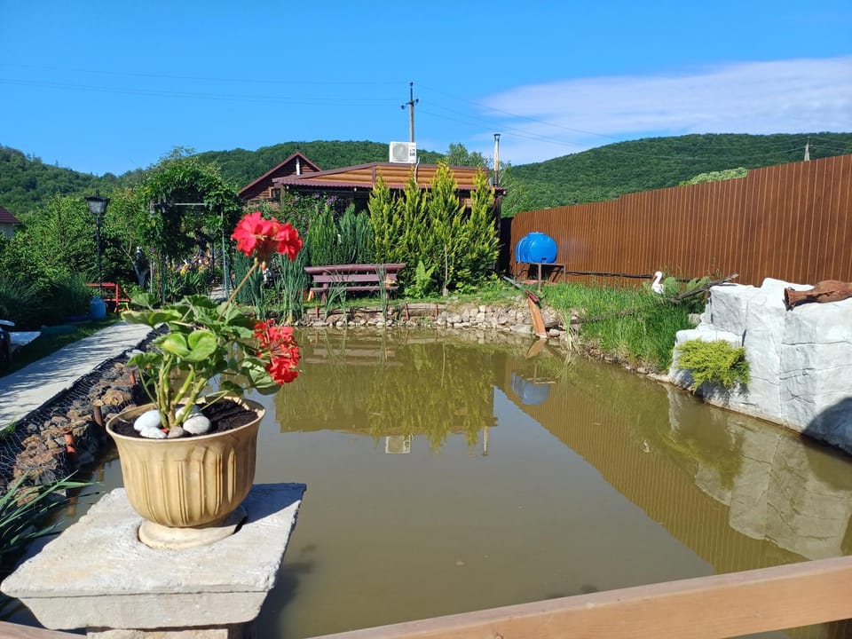 Facade/entrance, Natural landscape, Seating area, Lake view, Mountain view