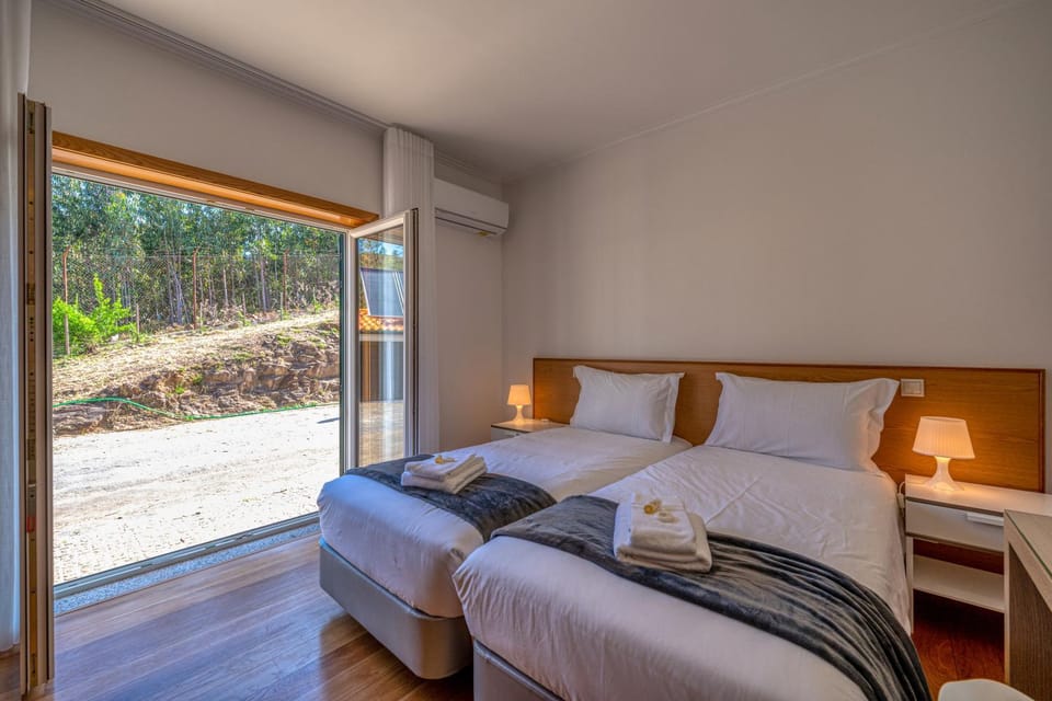 Bed, Photo of the whole room, Bedroom, towels, air conditioner