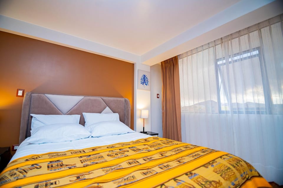 Apartahotel KIRI para empresas y familias que viajan en grupo cerca del Aeropuerto Juliaca Perú,con agua caliente Apartment in Puno, Peru
