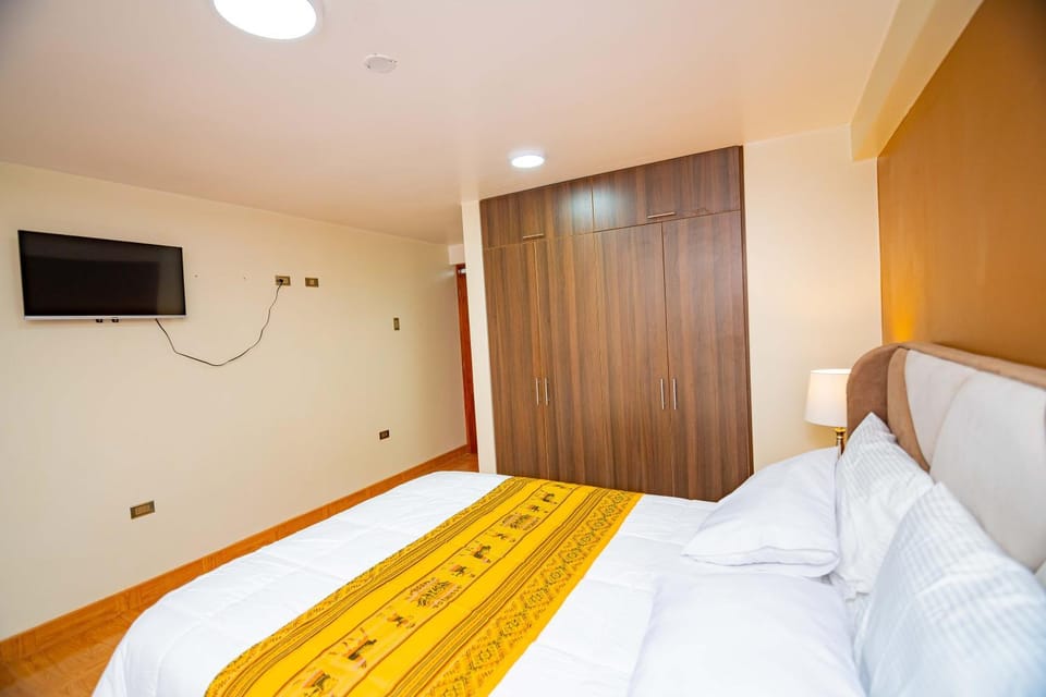 Departamentos KIRI para familias o empresas que viajan en grupo cerca al Aeropuerto Juliaca, con agua caliente Apartment in Puno, Peru