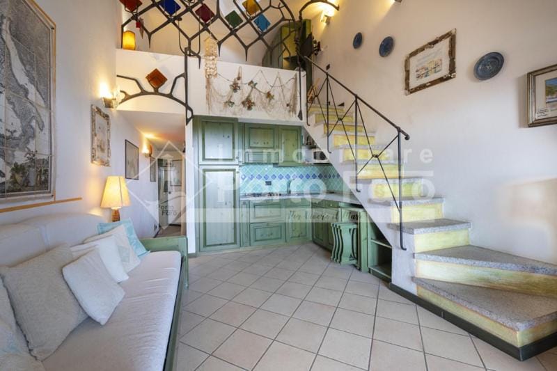 23 BAIA FARO - Trilocale mansardato con ampia terrazza vista mare Villa in Palau